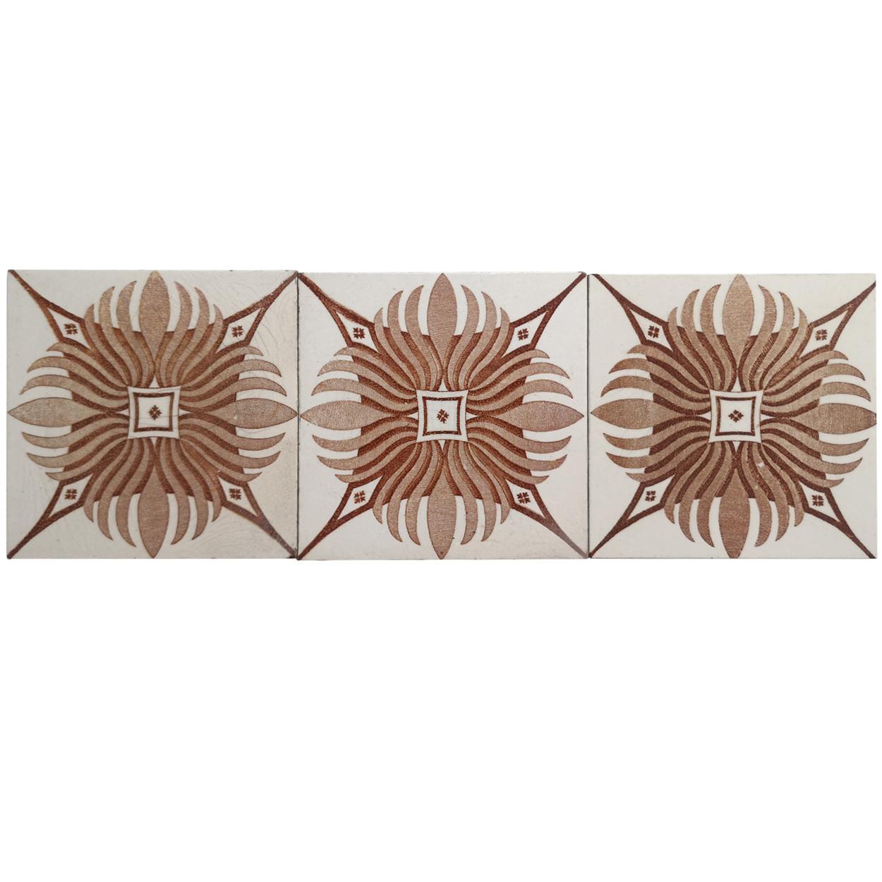 Recently lifted from its original home, a set of antique tiles from the early 20th century. With a beautiful geometric stylized design.
Manufactured by le Claive, circa 1920 

he dimensions per tile are 4.7 inch (12 cm) × 4.7 inch (12