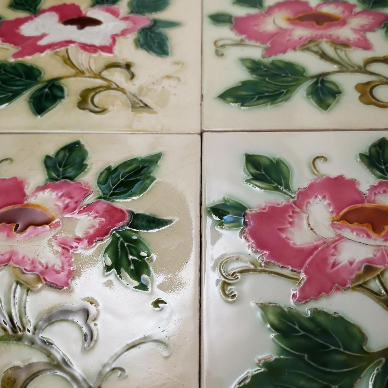 This is an amazing set of antique Art Nouveau handmade tiles with an image of pink rose in relief on a soft yellow background. These tiles would be charming displayed on easels, framed or incorporated into a custom tile design.

Please note that