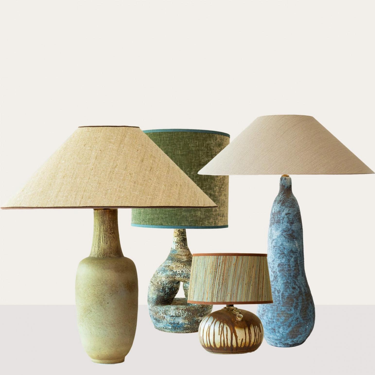 One of the four blue, green and brown ceramic floor table lamps, 1970s.

This set brings a rich visual appeal to any interior. With its beautiful shapes, it offers a unique presence.

The bases with warm, brown, blue and green tones fit perfectly