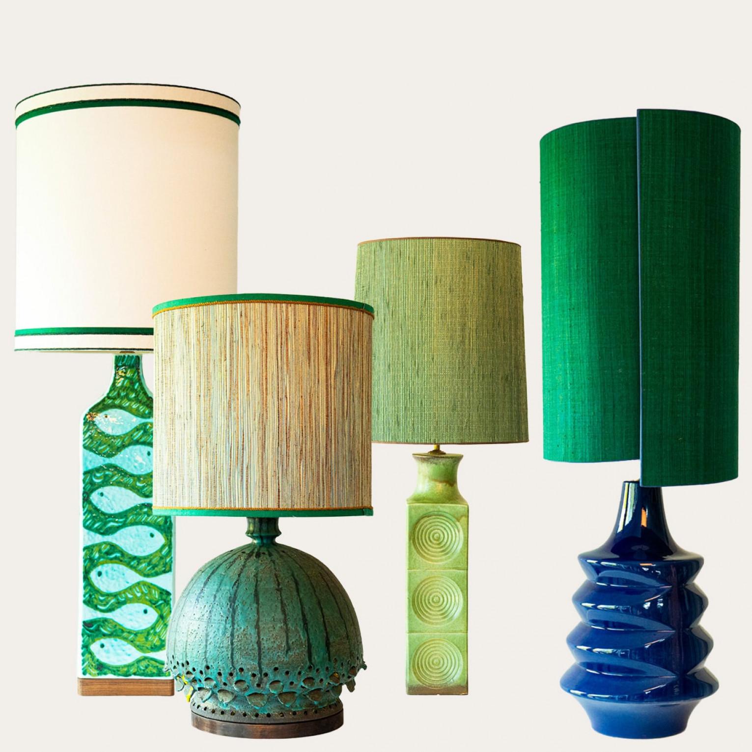 One of the four blue and green floor and table lamps, 1970s.

This set brings a rich visual appeal to any interior. With its beautiful shapes, it offers a unique presence.

The bases with vibrant green and blue tones and different shapes fit