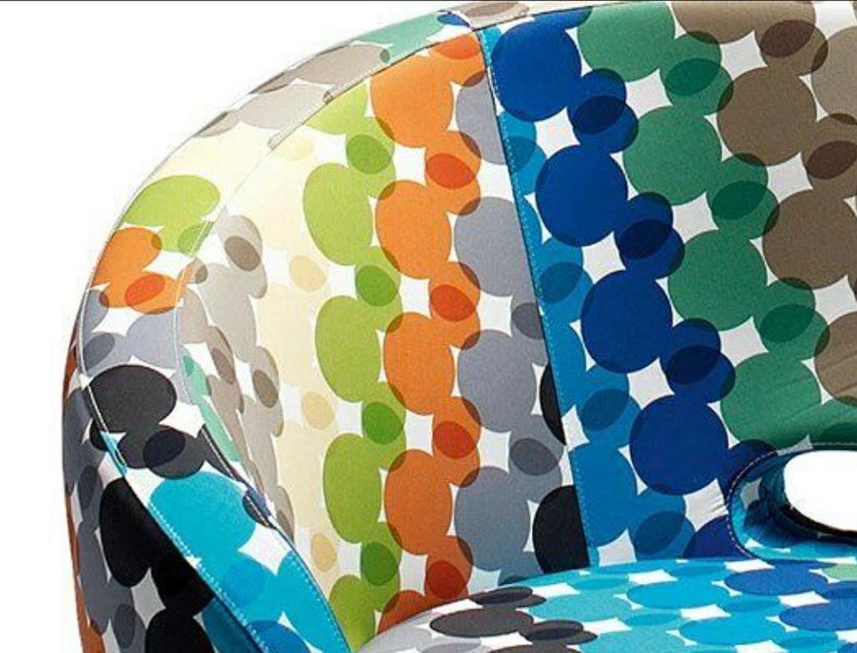 1 of the 4 of spectacular new rainbow Capellini rive droit chairs has a Walt Disney signature and is a limited edition collection. Only 5 of this Disney limited edition lounge chairs where made. Unique pieces with a unique fabric. It is also a