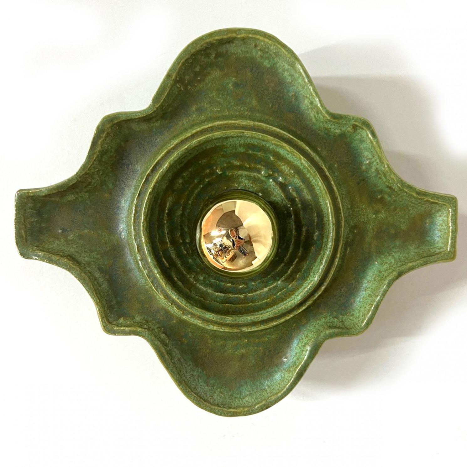 1 of the 4 Green ceramic wall lights in Fat Lava style. Manufactured in Germany in the 1970s.

The style of the glaze is called 'Fat Lava'. Which means the glaze is thick on some parts, like lava.
A typical way to finish ceramic in mid-century