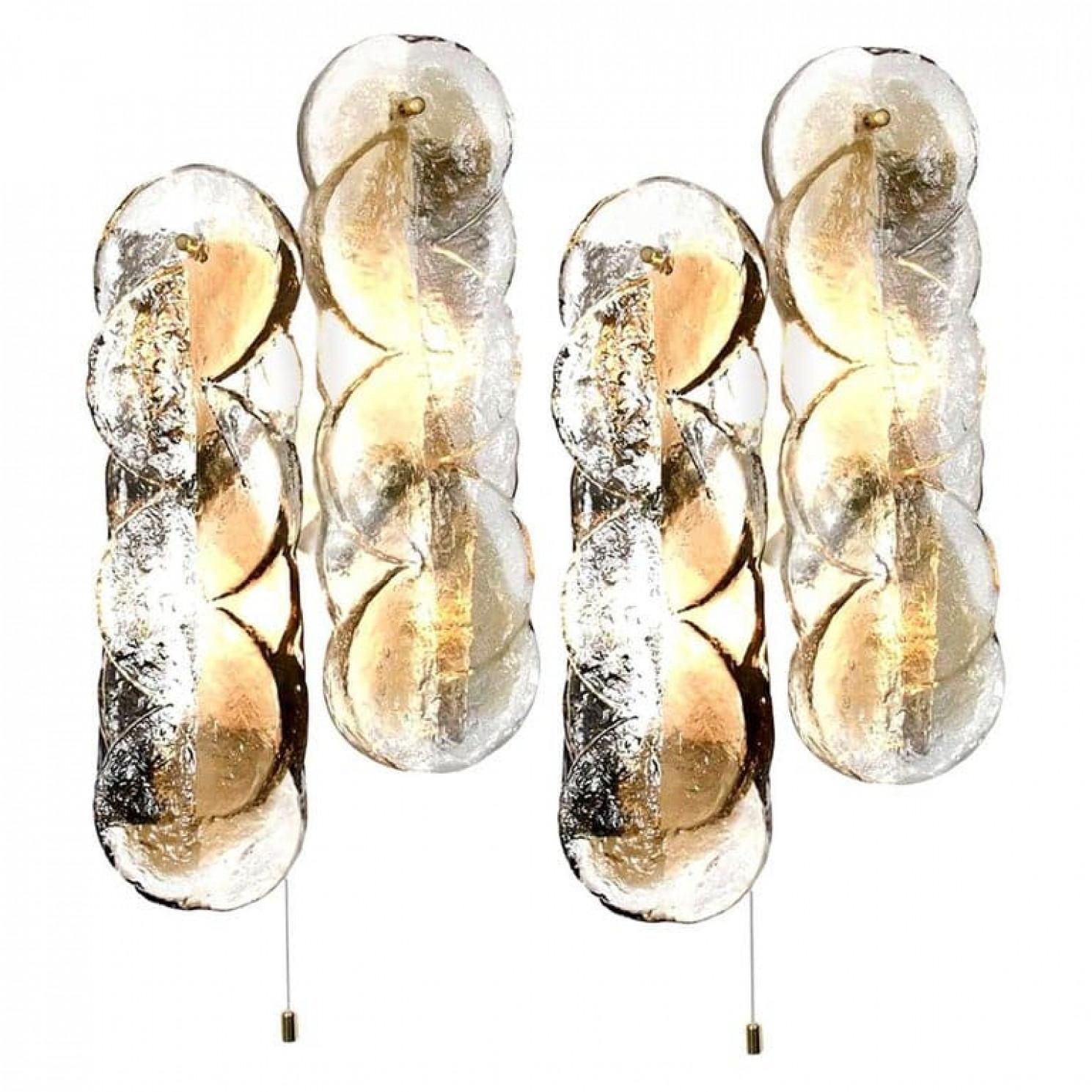1 of the 4 Kalmar swirl sconces with clear glass panels with light goldfish amber colored stripe in it. Beautiful, thick textured glass is complimented by white metal hardware. Beautiful brass knobs.

Please notice the price is for 1 piece. The