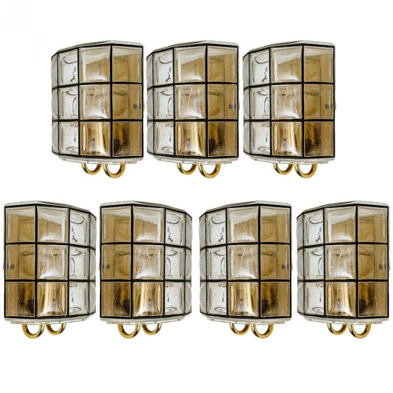 One of the four beautiful and unique hand blown glass wall lights. Manufactured by Glashütte Limburg in Germany during the 1960s, (late 1960s or early 1970s).

Beautiful craftsmanship. Elaborate clear bubble glass which bulges slightly out of its