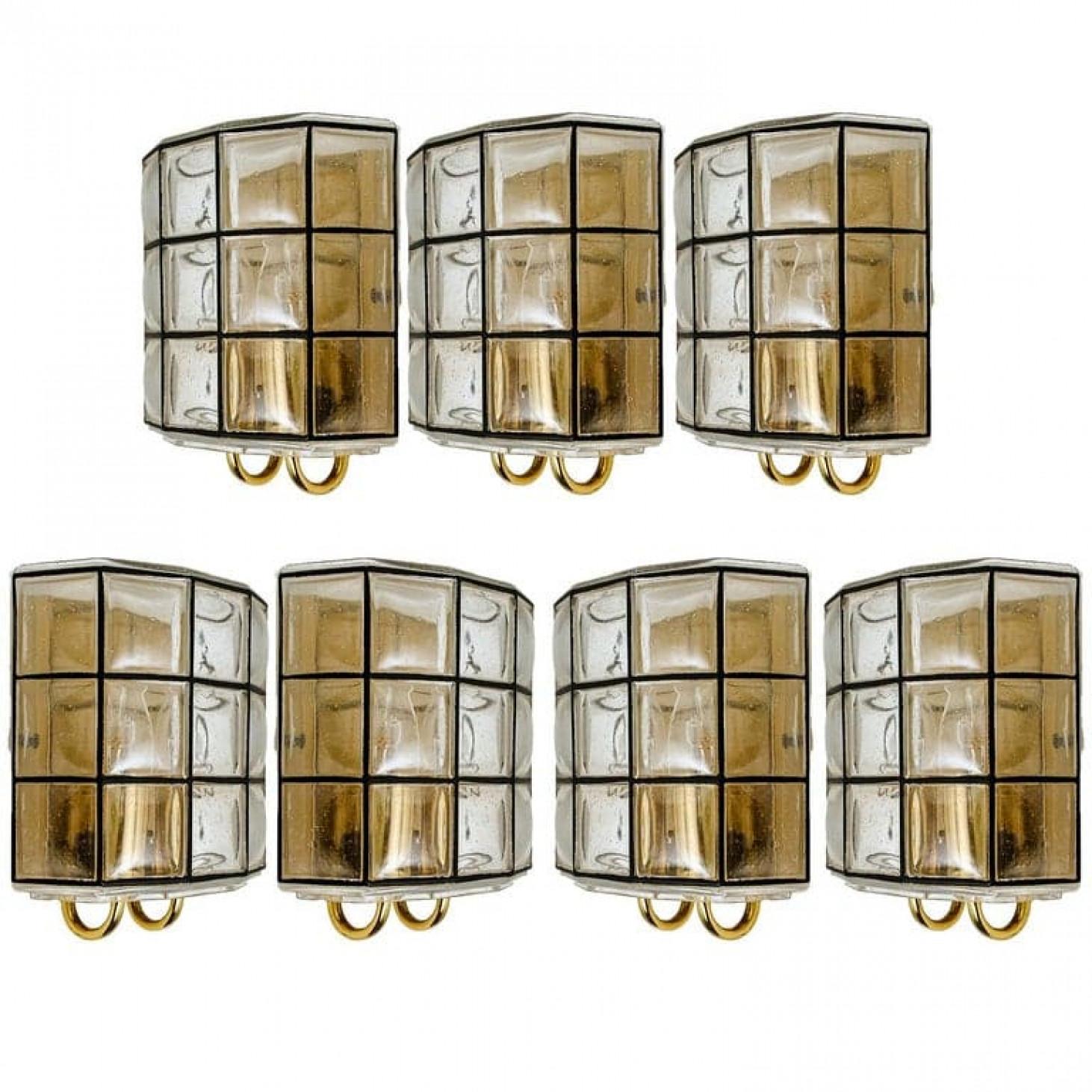 One of the four beautiful and unique hand blown glass wall lights. Manufactured by Glashütte Limburg in Germany during the 1960s, (late 1960s or early 1970s).

Beautiful craftsmanship. Elaborate clear bubble glass which bulges slightly out of its