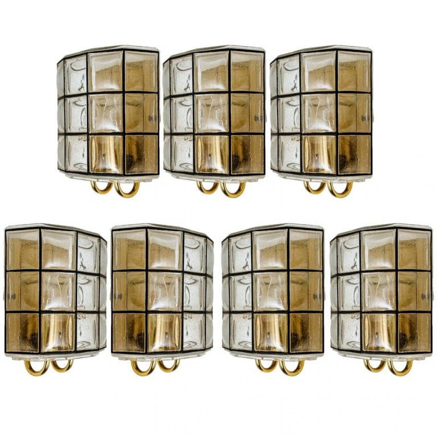 One of the four beautiful and unique hand blown glass wall lights. Manufactured by Glashütte Limburg in Germany during the 1960s, (late 1960s or early 1970s).

Beautiful craftsmanship. Elaborate clear bubble glass which bulges slightly out of its