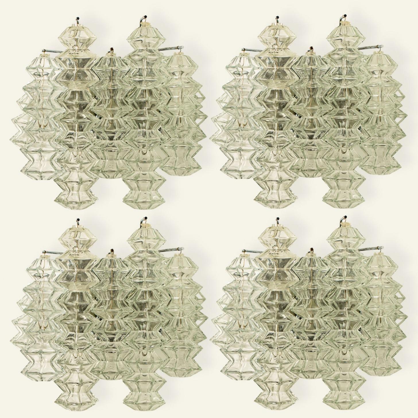 Mid Century Modern vintage glass chrome Pagoda sconces by Kalmar, circa 1969, Austria Vienna.

Each sconce shows 5 exceptional pagoda shaped glasses mounted on a chrome frame.

In excellent vintage condition both glass and brass frame, cleaned