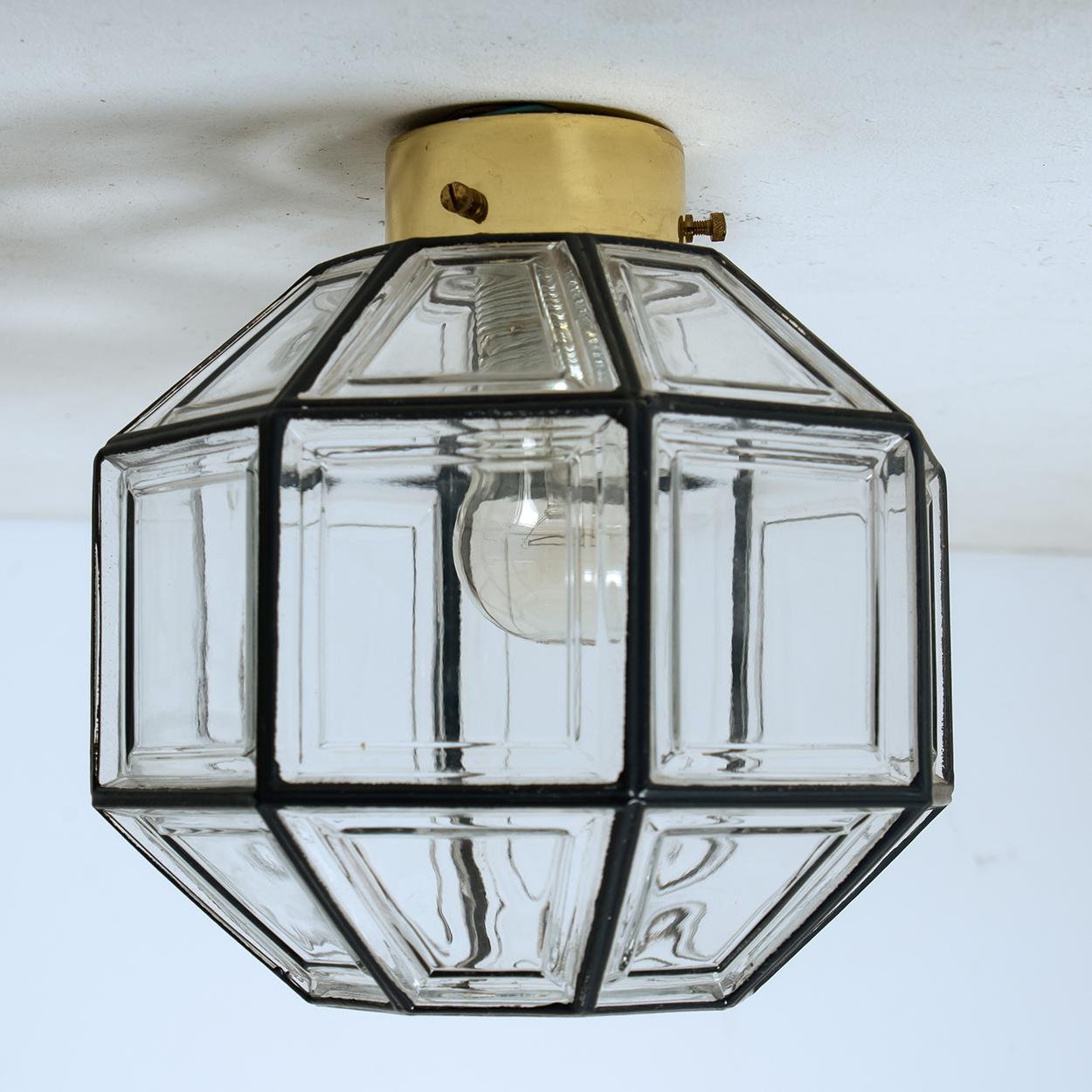 A beautiful set of octagonal glass light flush mounts or wall lights, manufactured by Glasshütte Limburg in Germany during the 1970s. Beautiful craftsmanship. Illuminates beautifully. They come from an old grand hotel in Germany.

Please note the