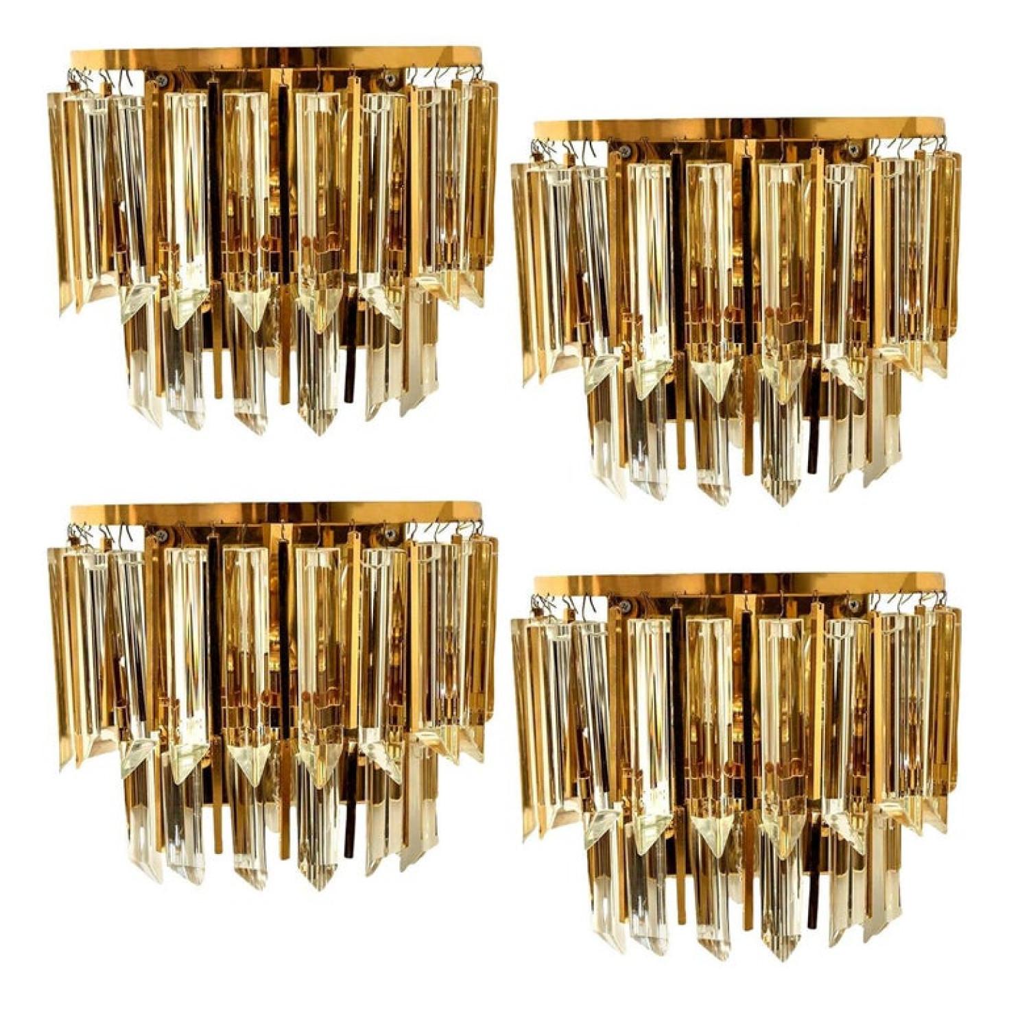 1 of the 4 Murano two-tiered glass wall sconces featuring two different sizes of long crystal clear glass 