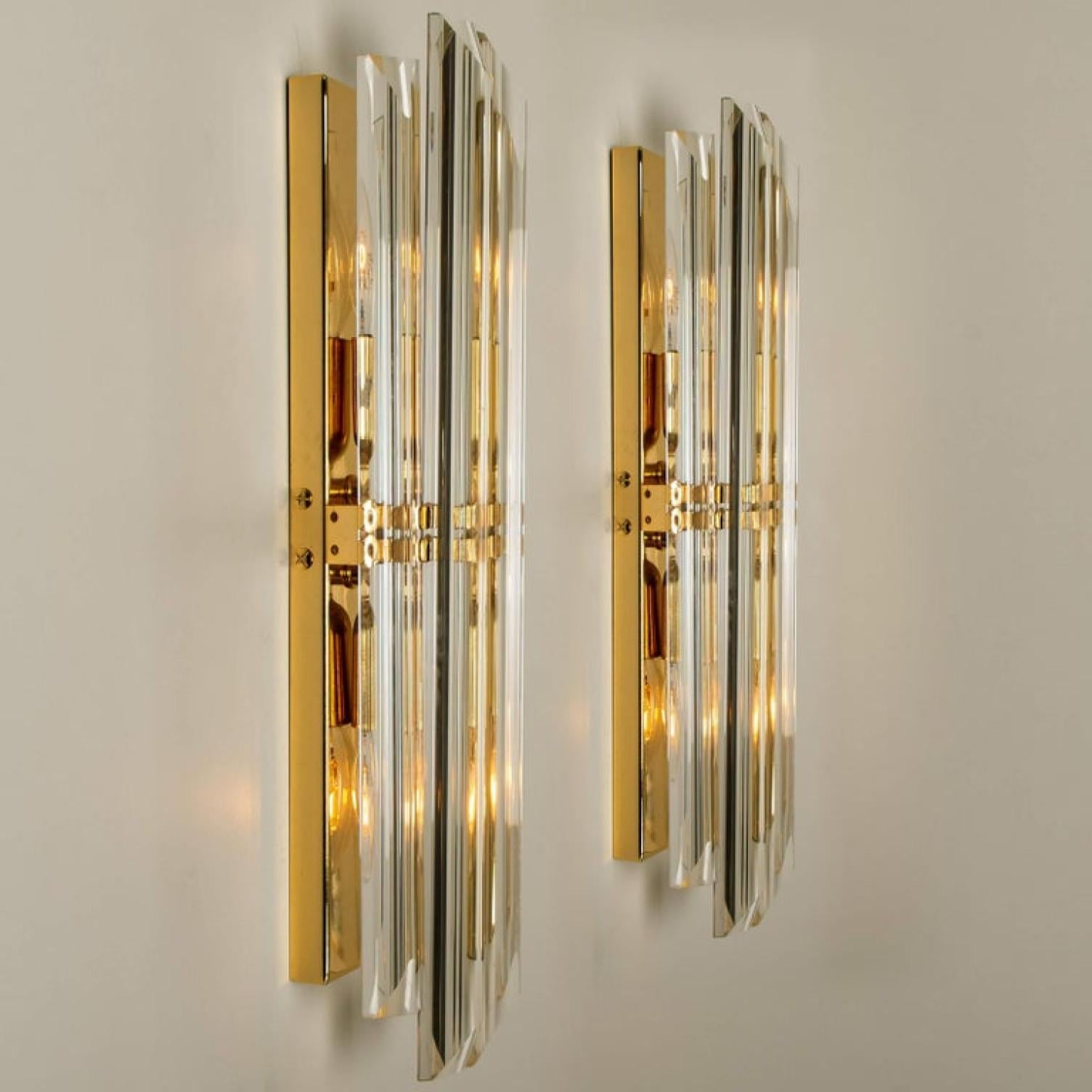 Set of Murano wall sconces each wall sconce is featuring four crystal clear glass 