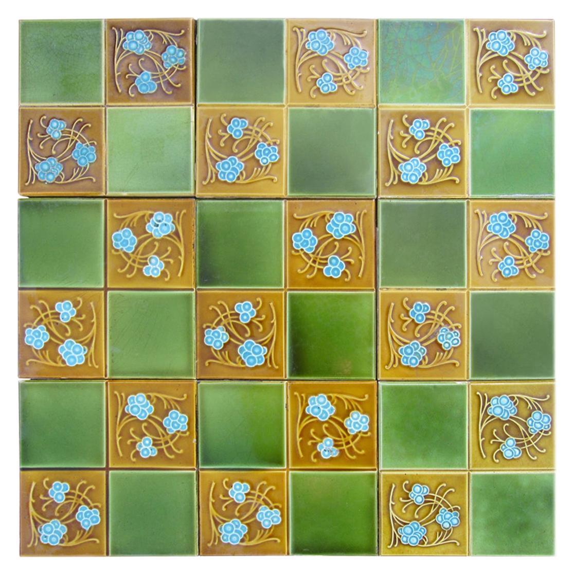 1 of the 40 amazing set handmade tiles in rich brown green and bright blue colors. Each tile is divided into four faces. Manufactured around 1920 by Gilliot Frères, Hemiksem, Belgium.
These tiles would be charming displayed on easels, framed or