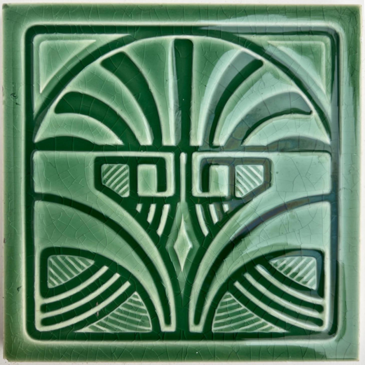 Handmade tiles in a beautiful green glazed color. Manufactured around 1920 by Nord Deutsche Steingutfabrik, Germany.
These tiles would be charming displayed on easels, framed or incorporated into a custom tile design.

We also have dark green border