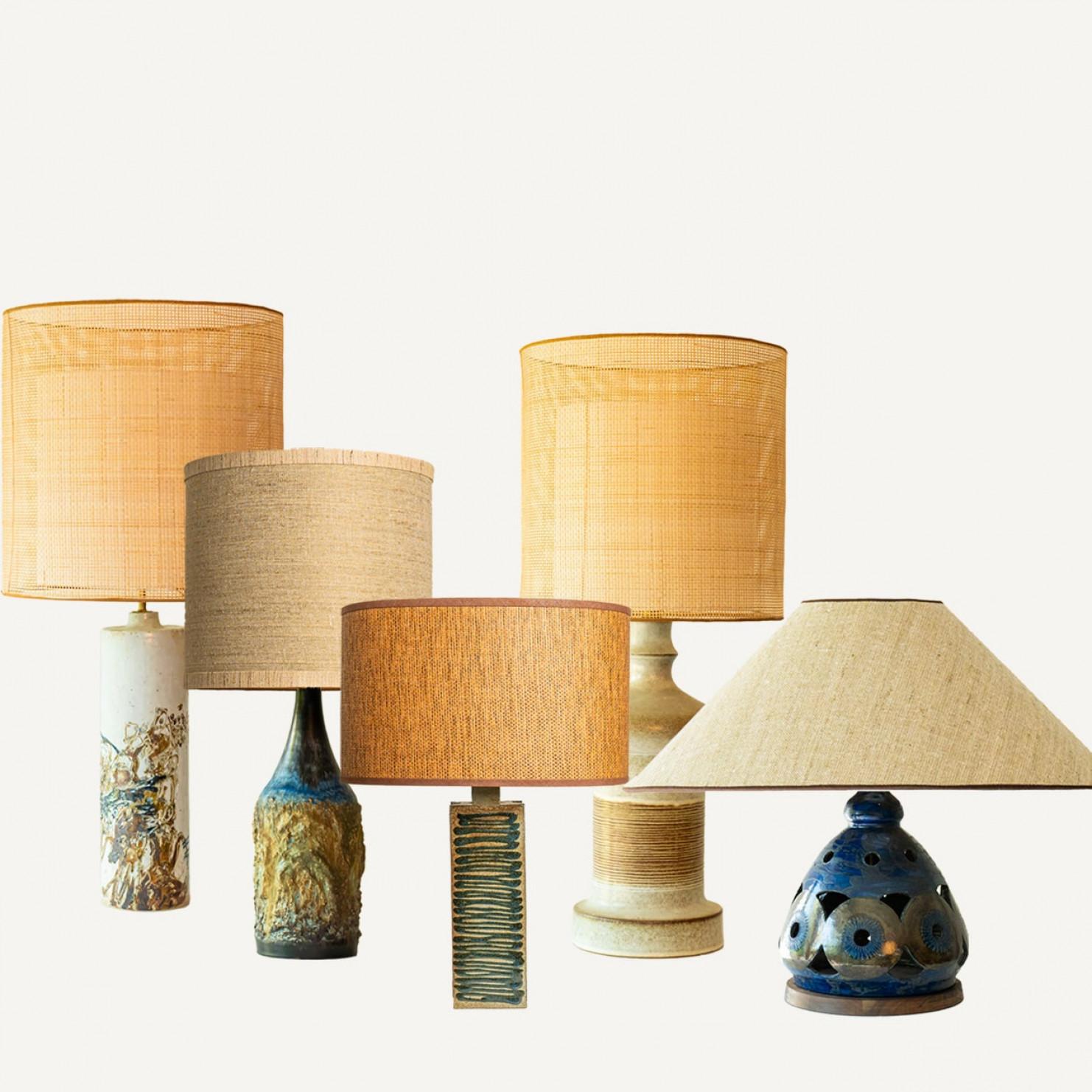 One of the five ceramic table lamps, 1970s.

This set brings a rich visual appeal to any interior. With its beautiful shapes, it offers a unique presence.

The bases with warm, neutral, blue and green tones fit perfectly with the custom made lamp