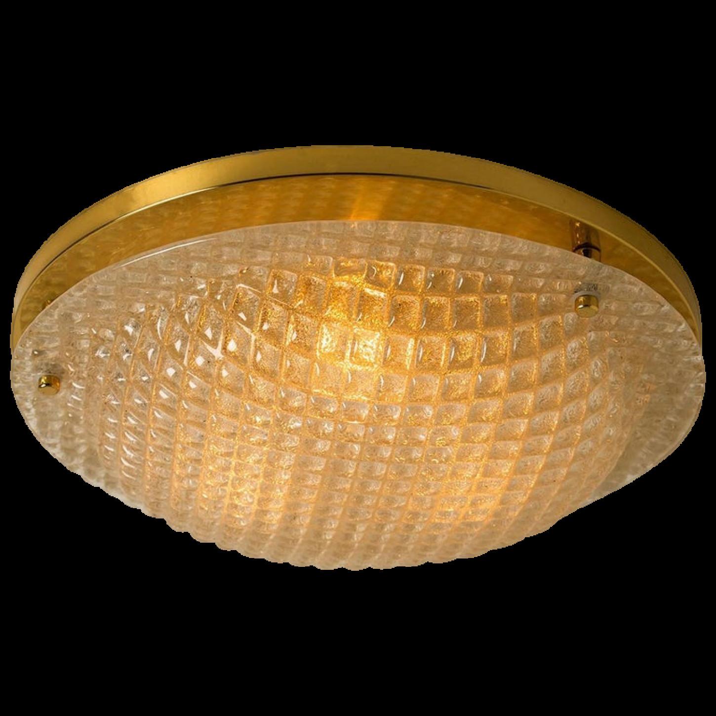 A high quality modern textured ice glass flush mounts by Hillebrand, circa 1965.
This flush mount is featuring a huge round hand blown glass dish with blocked pattern. Beautiful craftsmanship.

Can also work for impressive wall light. 5 pieces