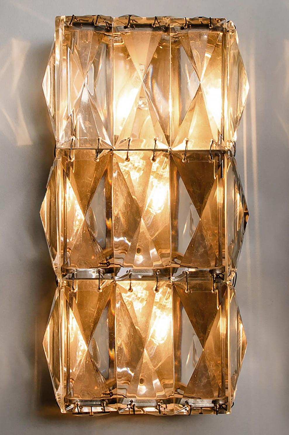 One of the six wall light fixtures by Bakalowits, Austria, heavy quality. The fixtures are comfortable with all decor periods and executed to a very high standard. The high quality rectangular crystals are reflecting the light beautifully.

Base