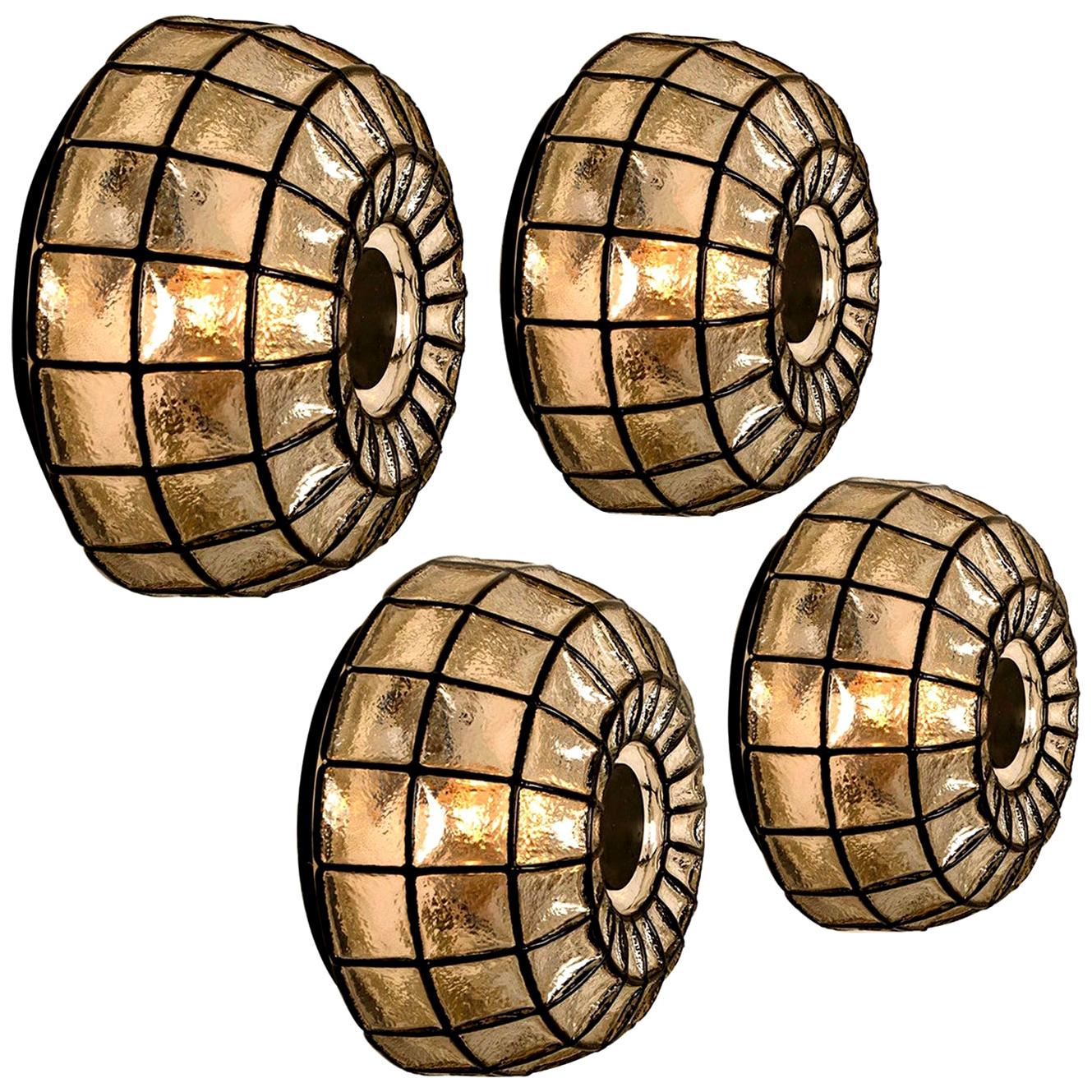 This beautiful and unique octagonal glass light flush mounts or wall lights or sconces were manufactured by Glashütte Limburg in Germany during the 1960s (late 1960s or early 1970s). Nice craftsmanship. This glass is blown and finished by hand. Each