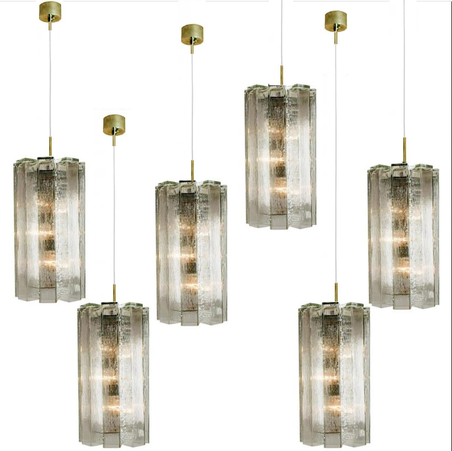 1 of the of the 6 Cascade hand blown lamps in a pendant design, model 4308, manufactured by Doria. It is suitable especially for high ceilings and lounge areas. The 8 square glass tubes create a beautiful lighting effect.

Minimalistic design