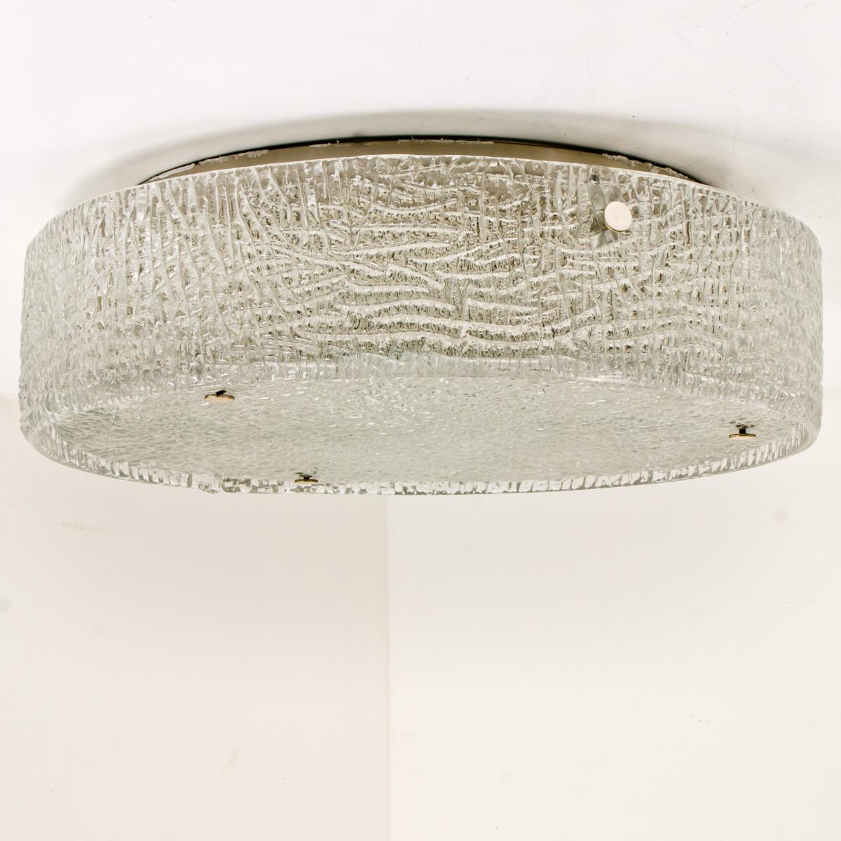 1 of the 6 Mid-Century Modern textured ice glass light fixtures by manufacturer Kaiser, circa 1965. Measures: Clean simple but high-end design. Illuminates beautifully. Each light fixture, often mistakenly attributed to Kalmar, features a huge