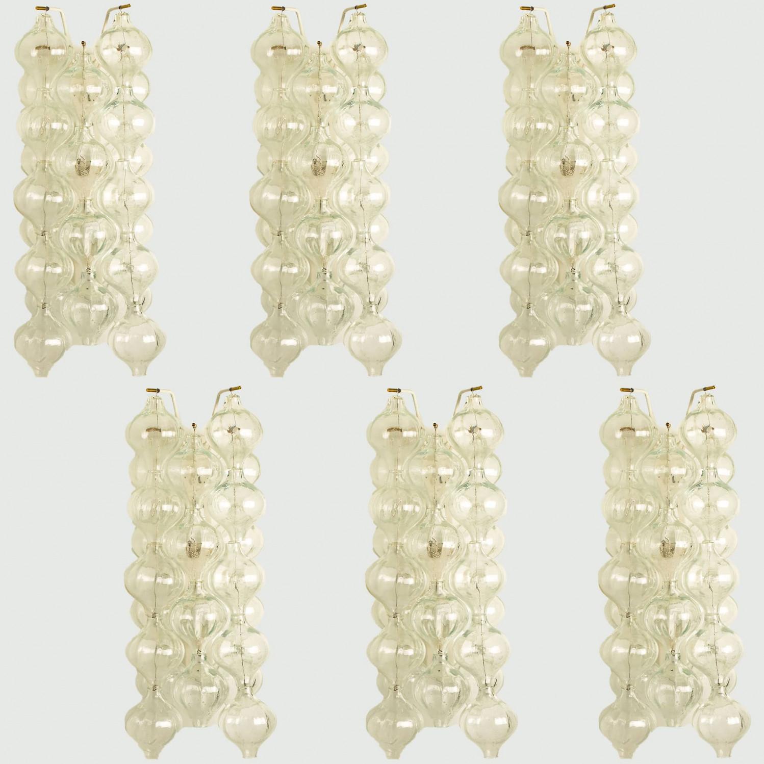 1 of the 2 pairs unique large and elegant 'Tulipan' glass wall sconces by J.T. Kalmar, Austria, Vienna, manufactured in midcentury, circa 1970 (late 1960s or-early 1970s). Tulip shaped hand blown bubble glasses. With a white enameled metal frame