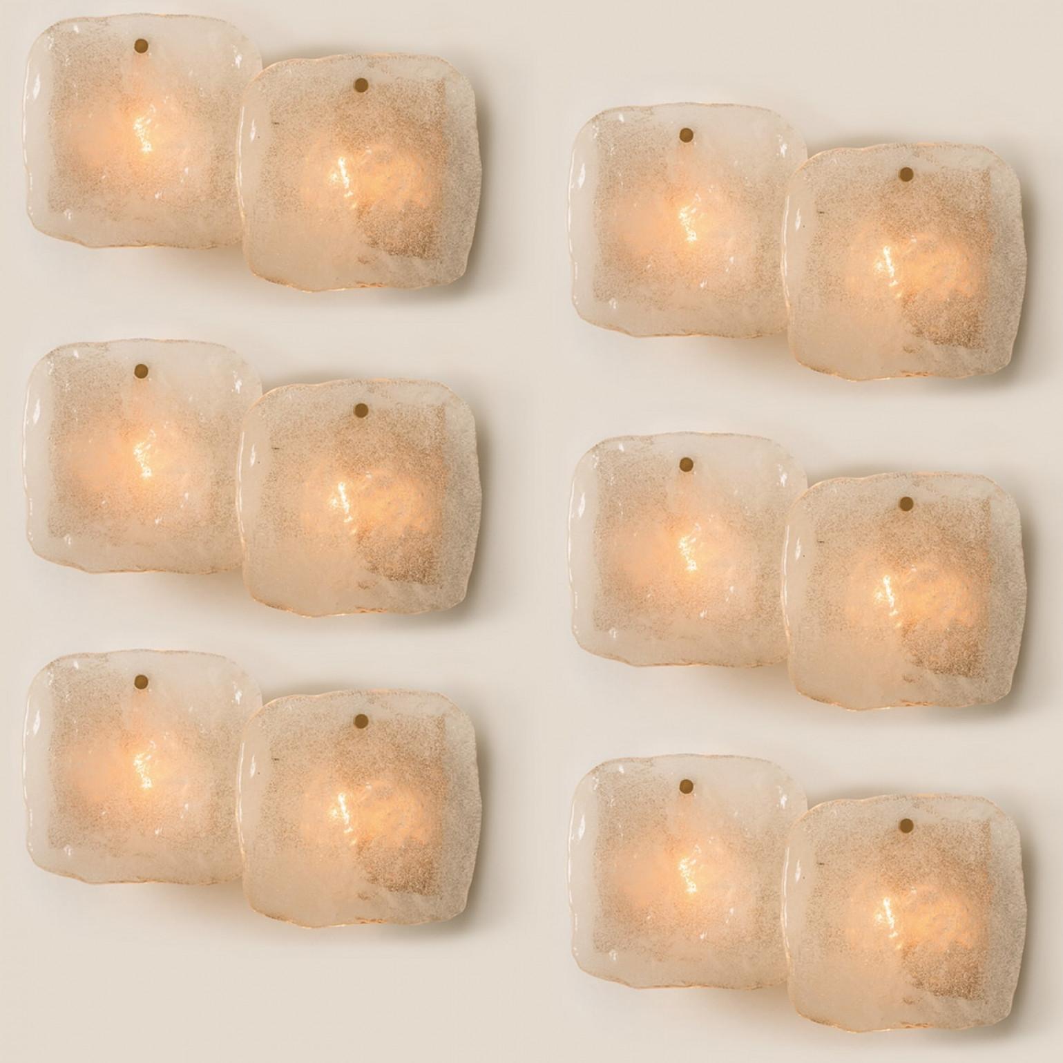 1 of the 6 of light fixtures designed by J.T Kalmar, manufactured by Kalmar Franken, Austria in the 1960s.
High-end and handmade design from the 20th century. The large squares of white, opaque textured glass shades provides a nicely diffuse