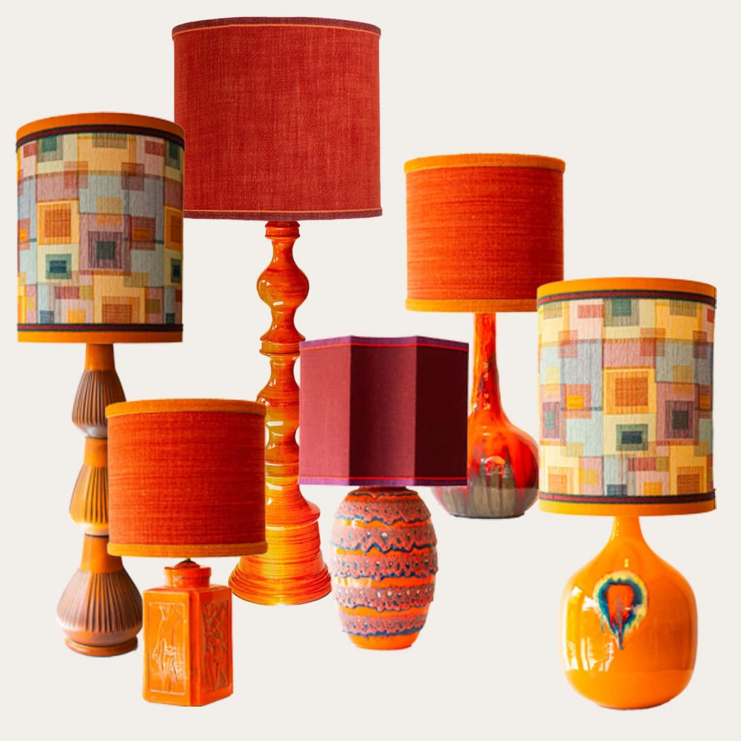 One of the six orange and red floor and table lamps, 1970s.

This set brings a rich visual appeal to any interior. With its beautiful shapes, it offers a unique presence.

The bases with warm, ochre, brown and orange tones and different materials