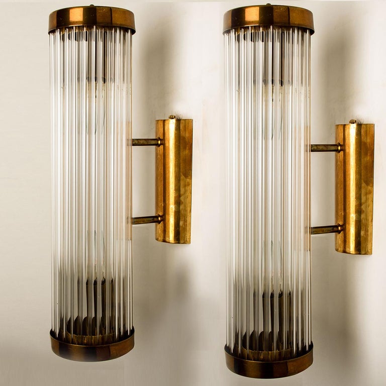 A  stunning  Art Deco Machine Age skyscraper style sconce. With their clean modernist lines and beautiful attention to detail, these sconces would be a winning addition to any style of interior from classic Deco to contemporary. They have been newly