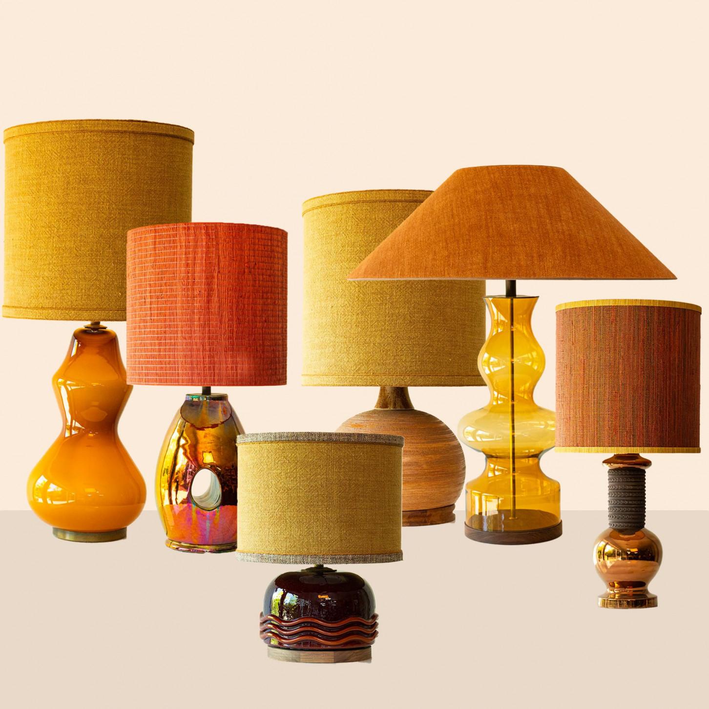 One of the six floor and table lamps, 1970s.

This set brings a rich visual appeal to any interior. With its beautiful shapes, it offers a unique presence.

The bases with warm, ochre, brown and orange tones and different materials and shapes fit