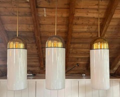 1 of the 6 XL Opaque Glass / Brass Pendant Lights by Limburg, 1970s