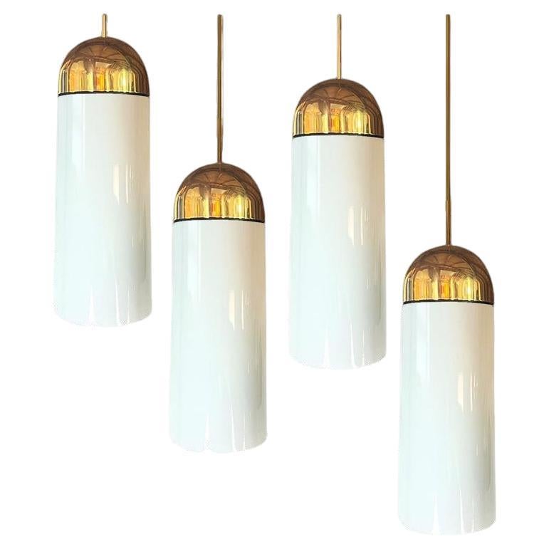 1 of the 6 XL Opaque Glass / Brass Pendant Lights by Limburg, 1970s For Sale