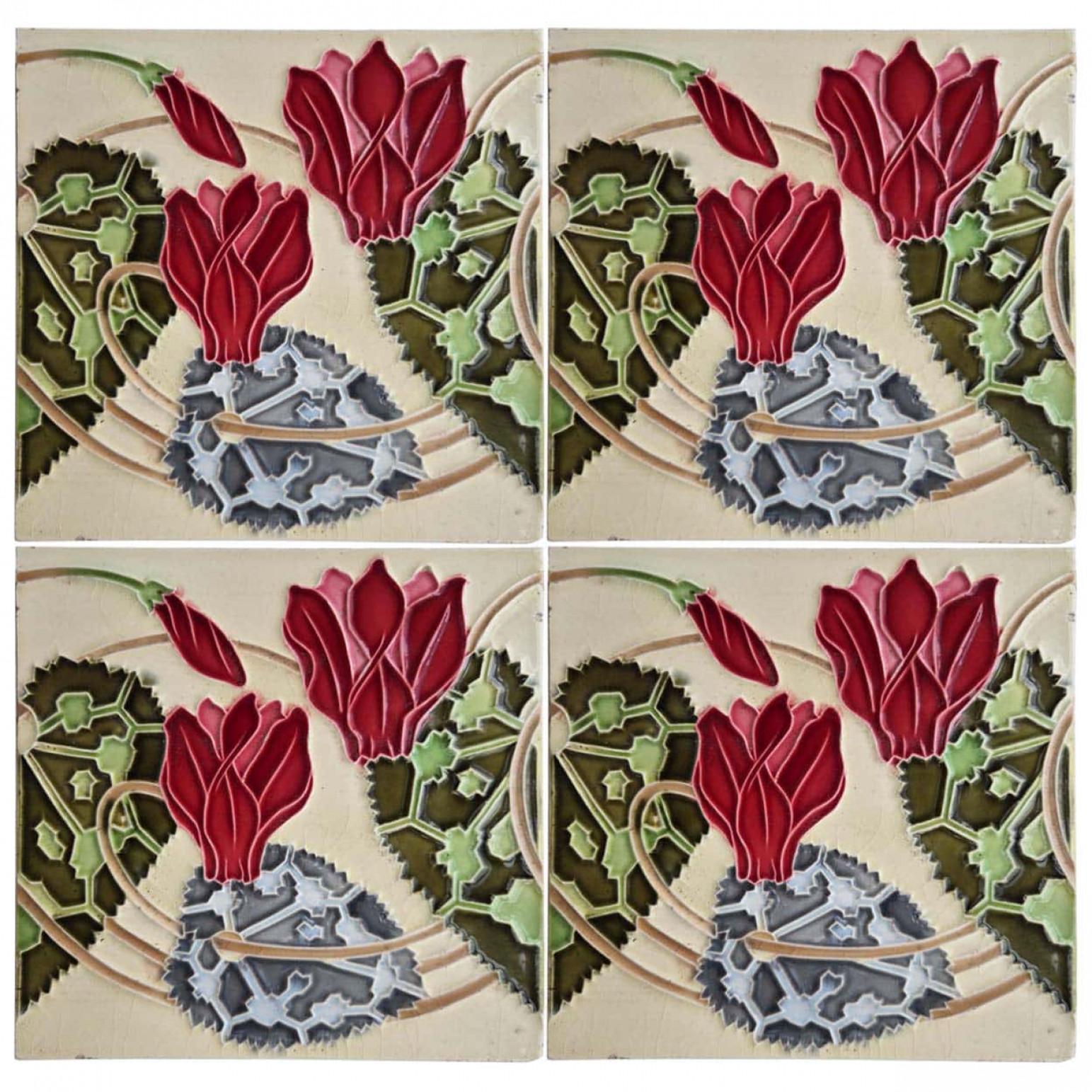 1 of the 63 handmade floral antique tiles wiht rich glazed colors. Manufactured around 1920 by Gilliot Hemiksem, Belgium.

Image on the tile in relief on light yellow ground. Very nice to combine with narrow gray edges.

These tiles would be