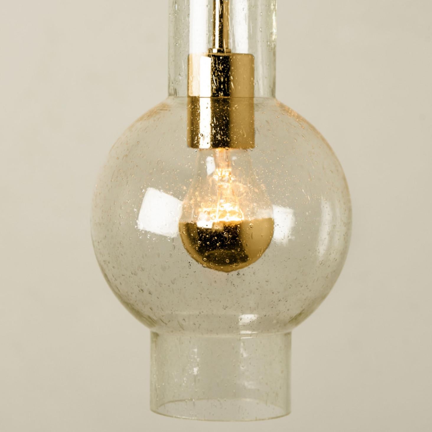 German 1 of the 7 Blown Glass and Brass Tube Pedant Lights by Staff Leuchten, 1970s For Sale
