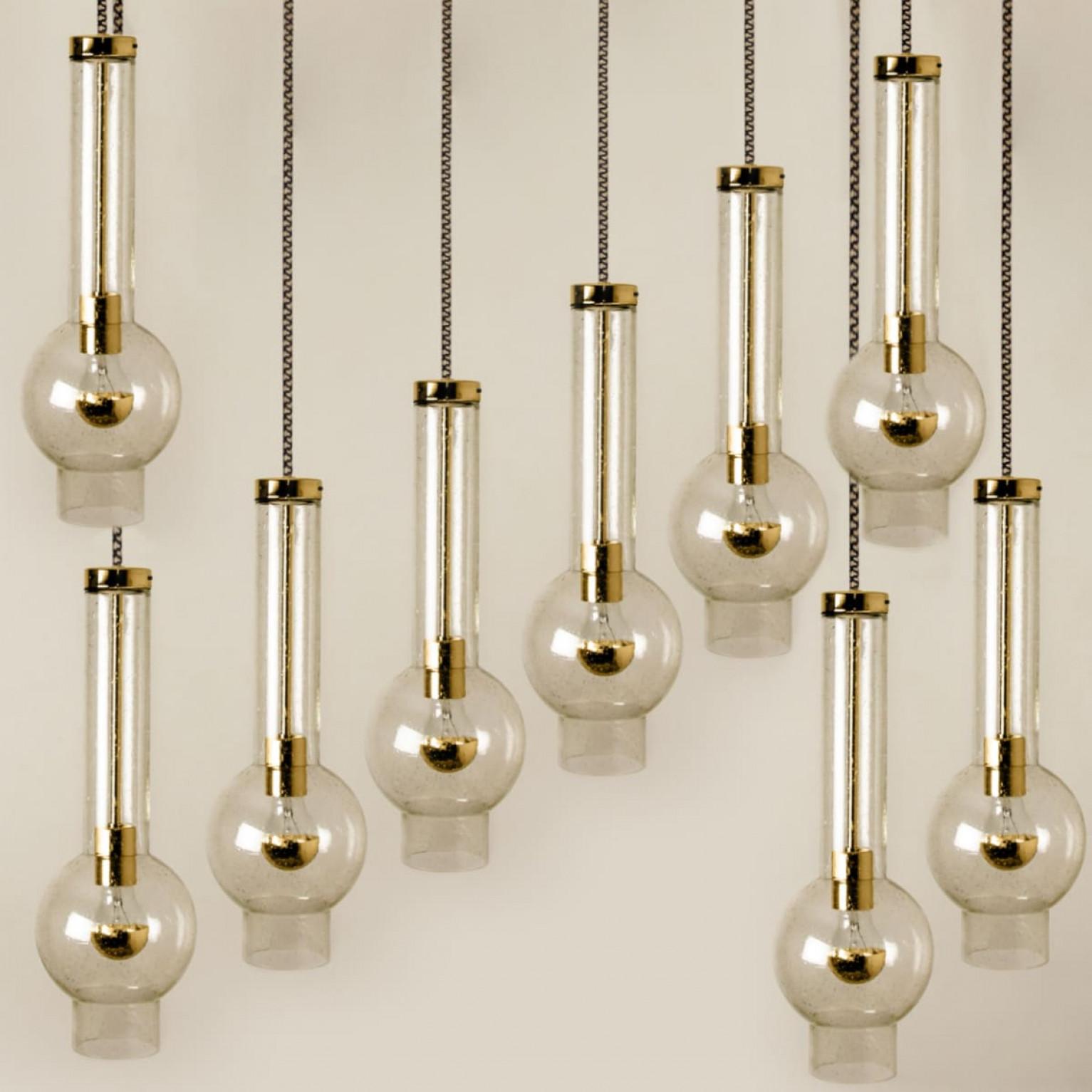 1 of the 7 Blown Glass and Brass Tube Pedant Lights by Staff Leuchten, 1970s In Good Condition For Sale In Rijssen, NL