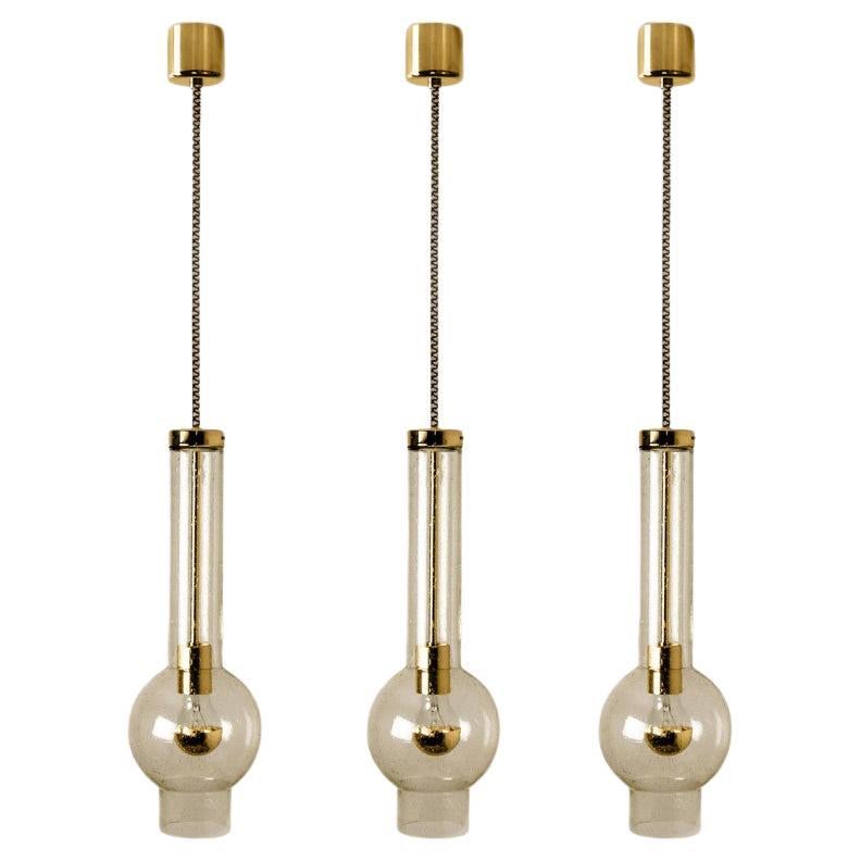 1 of the 7 Blown Glass and Brass Tube Pedant Lights by Staff Leuchten, 1970s For Sale