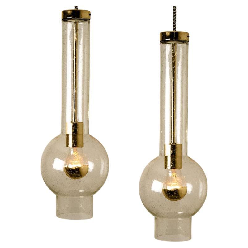 1 delle 7 luci a pedale in vetro soffiato e tubo d
ottone di Staff Leuchten, anni
70