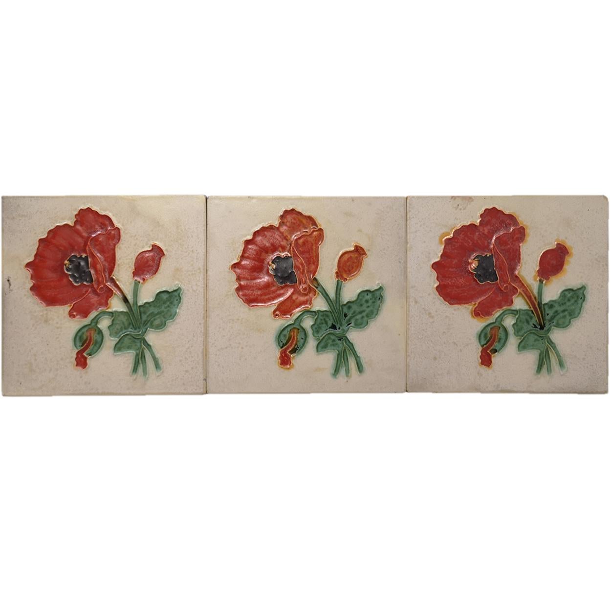 This is an amazing set of antique Art Nouveau handmade tiles with an image of a red Poppy in relief. These tiles would be charming displayed on easels, framed or incorporated into a custom tile design.

Please note that the price is per piece. We