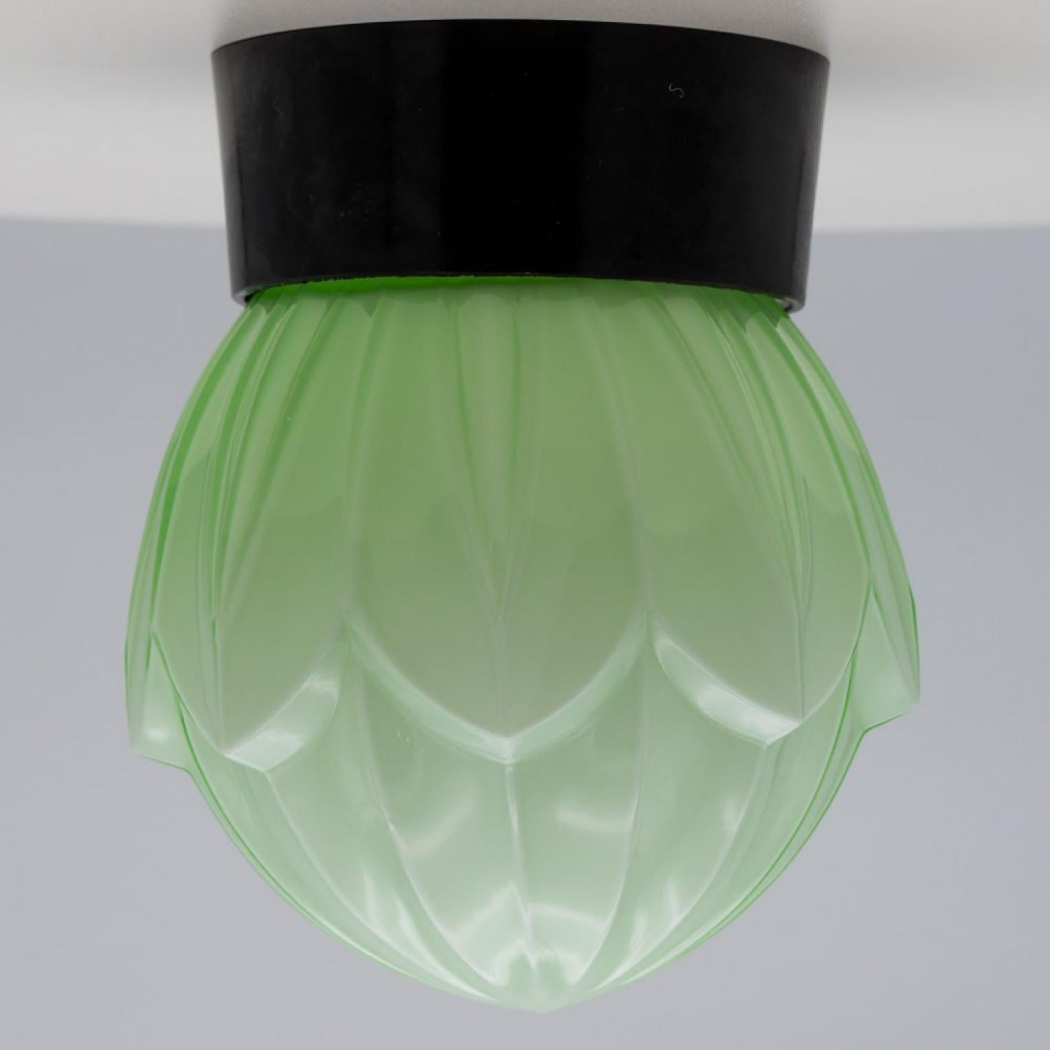 1 of the 8 Green Pastel Colored Thabur lights, Bakelite Pressed Glass, 1930 For Sale 8