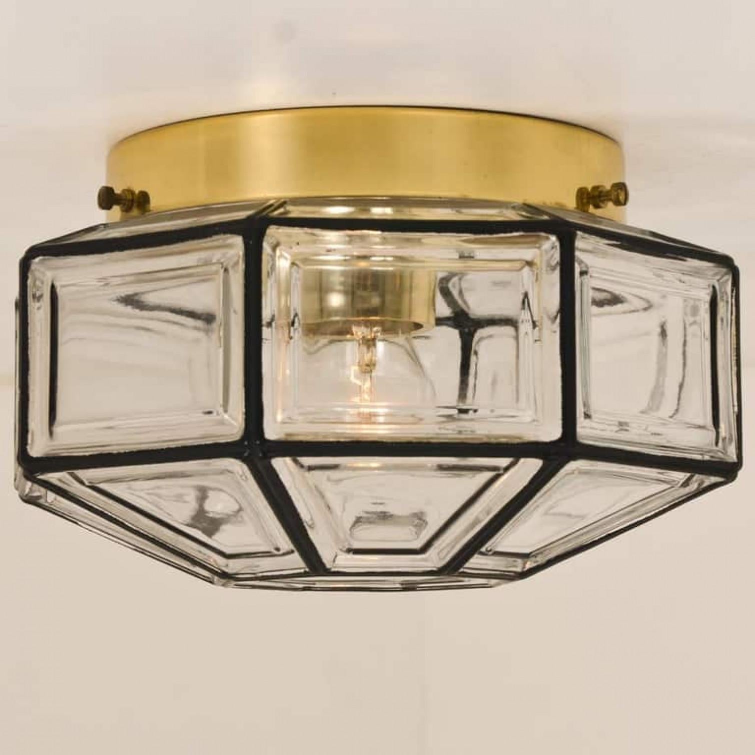 Several  beautiful set octagonal glass light flush mounts or wall lights were manufactured by Glashütte Limburg in Germany during the 1970s. Beautiful craftsmanship. Illuminates beautifully.

Please note the price is for one-piece. several pieces