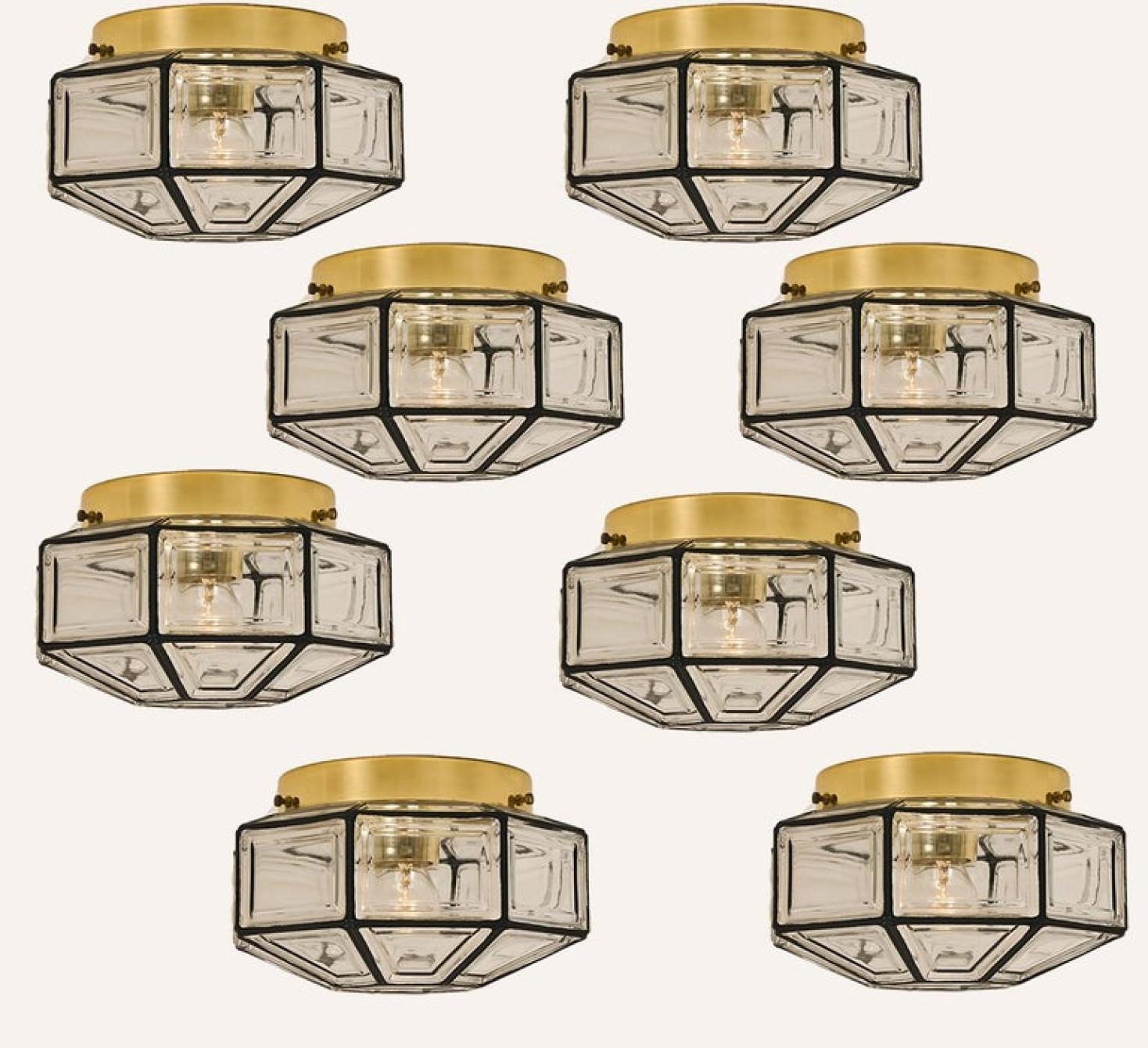 1 of the 8 beautiful set octagonal glass light flush mounts or wall lights were manufactured by Glashütte Limburg in Germany during the 1970s. Beautiful craftsmanship. Illuminates beautifully.

Please note the price is for one-piece. 8 pieces