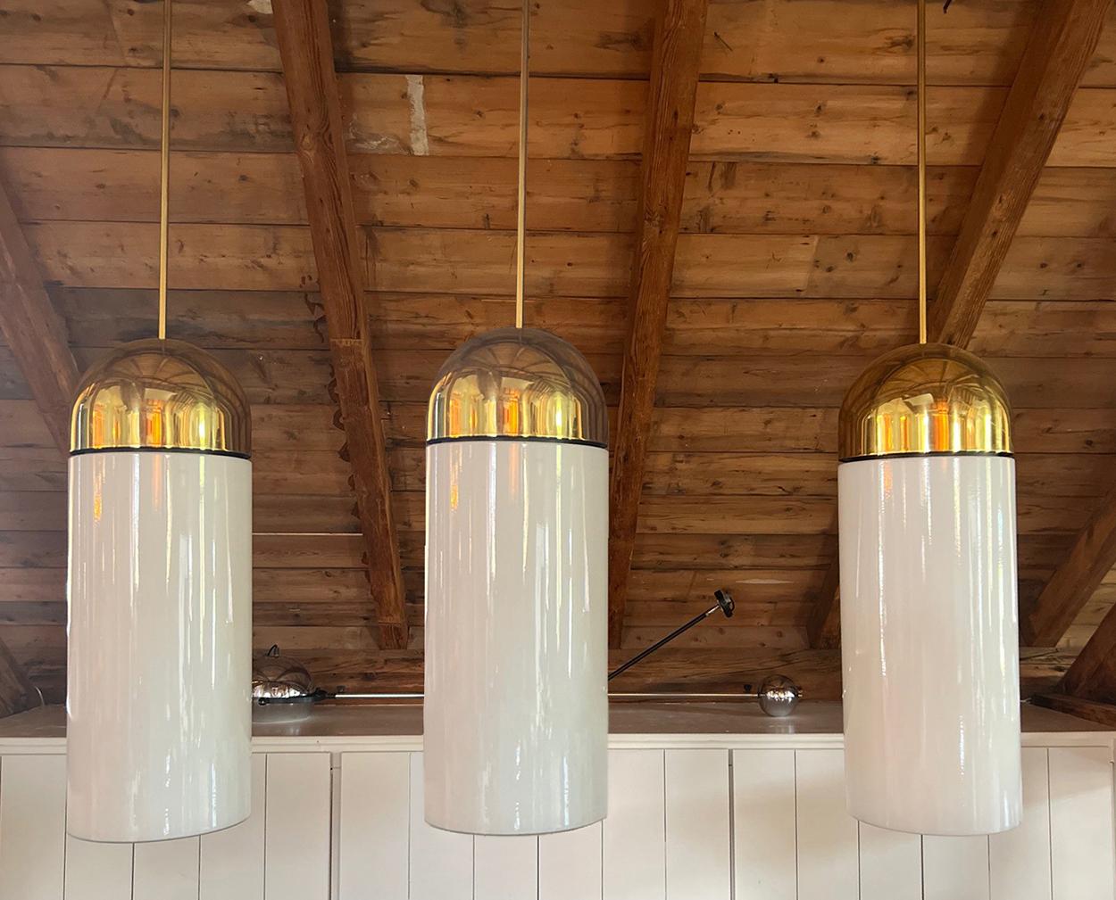 1 of the 5 XL Opaque Glass / Brass Pendant Lights by Limburg, 1970s In Good Condition For Sale In Rijssen, NL