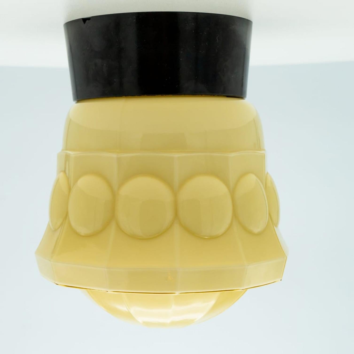 1 of the 8 Yellow and Brown Pastel Thabur lights, Bakelite Pressed Glass, 1930 For Sale 7