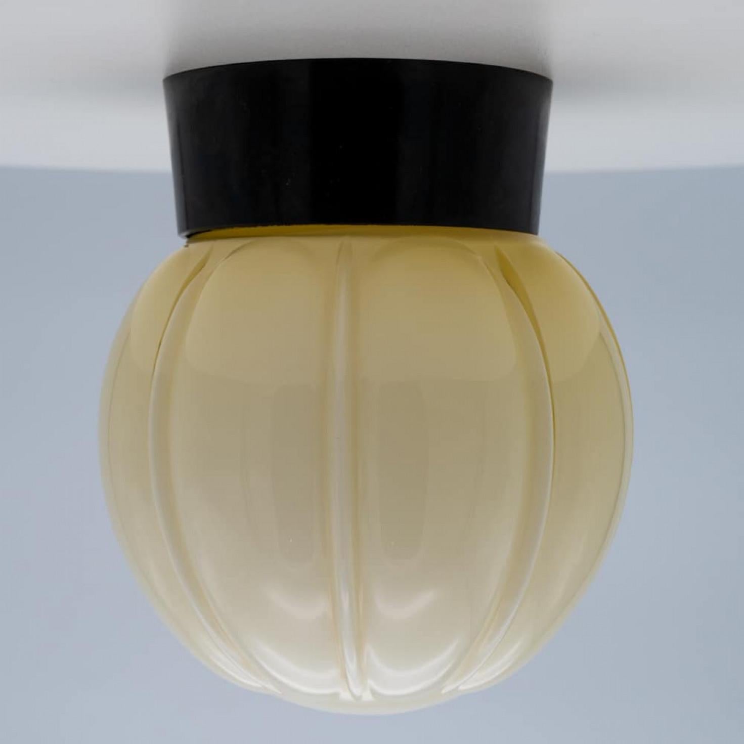 Dutch 1 of the 8 Yellow and Brown Pastel Thabur lights, Bakelite Pressed Glass, 1930 For Sale