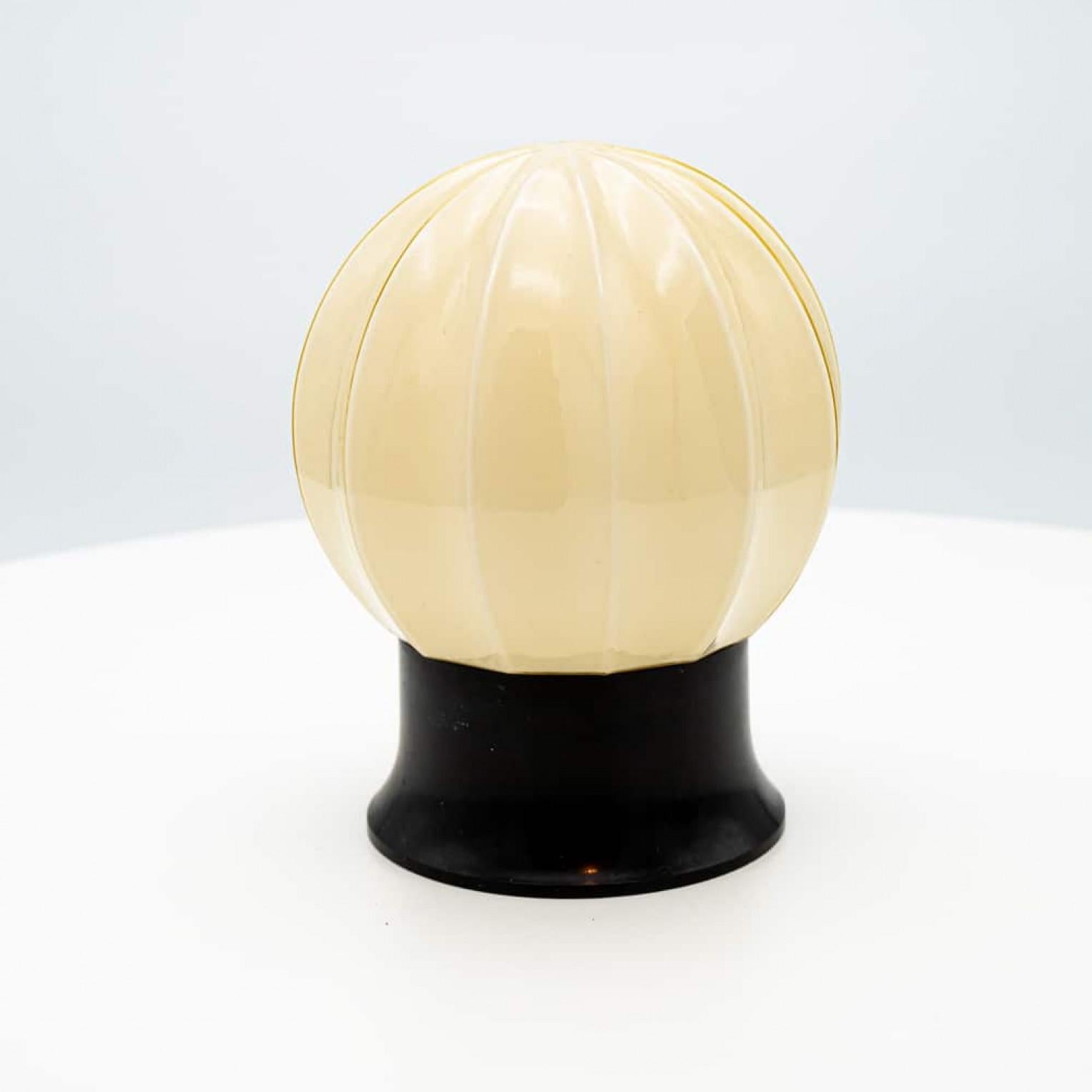 1 of the 8 Yellow and Brown Pastel Thabur lights, Bakelite Pressed Glass, 1930 For Sale 1
