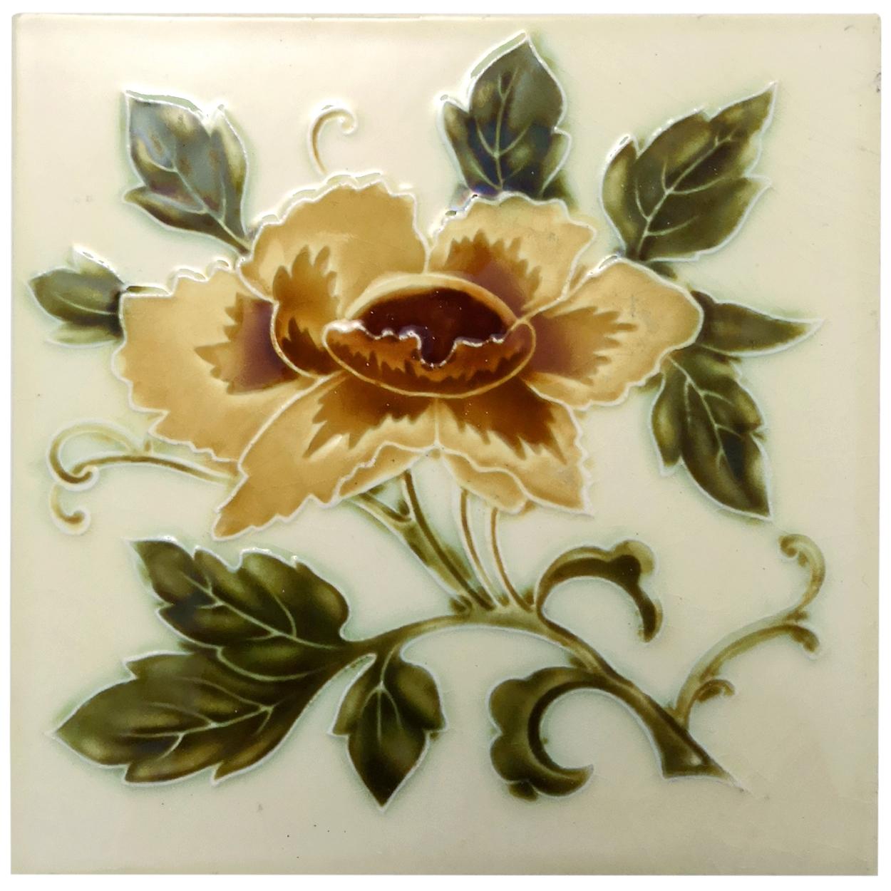 This is an amazing set of antique Art Nouveau handmade tiles with an image of yellow rose in relief on a soft yellow background. These tiles would be charming displayed on easels, framed or incorporated into a custom tile design.

Please note that