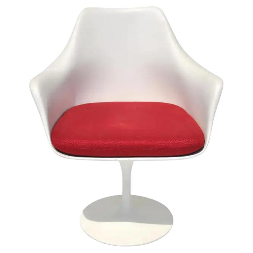 Designer: Saarinen, Eero.
Date of design: 1956.
Model number: 150A.
Made in France.
Materials: Base is cast aluminum, lacquer paint finish. The shell is molded fiber glass reinforced plastic.
Original Knoll upholstered detachable cushions.
Swivel