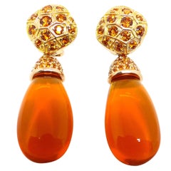 Earrings in Red Gold with 2 Fire Opal Brioletts and Mandarine Garnets.