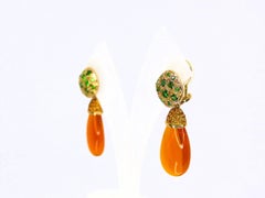 Earrings in Red Gold with 2 Fire Opal Brioletts 28x13x8mm and 26 Tsavorites.