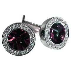 1 paire de boucles d'oreilles en platine avec tourmaline rose ronde et 50 fleurons Fvs 0,27 carat