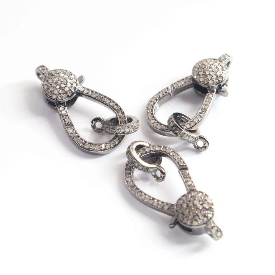 
1 Pc Pave Diamond Lobster Clasps 925 Sterling Silver Double Sided Diamond Clasps

Size: 30x12 mm Approx.

Light weight can be worn everyday
Shape
heart

Pierre
Diamond

Type
beads

Size
15 - 15.9 mm
Handmade
Yes

Country/Region of
