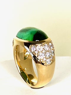 1 Ring in 750/Rosegold with 1 Tourmaline Cab. + Diamonds Pavé