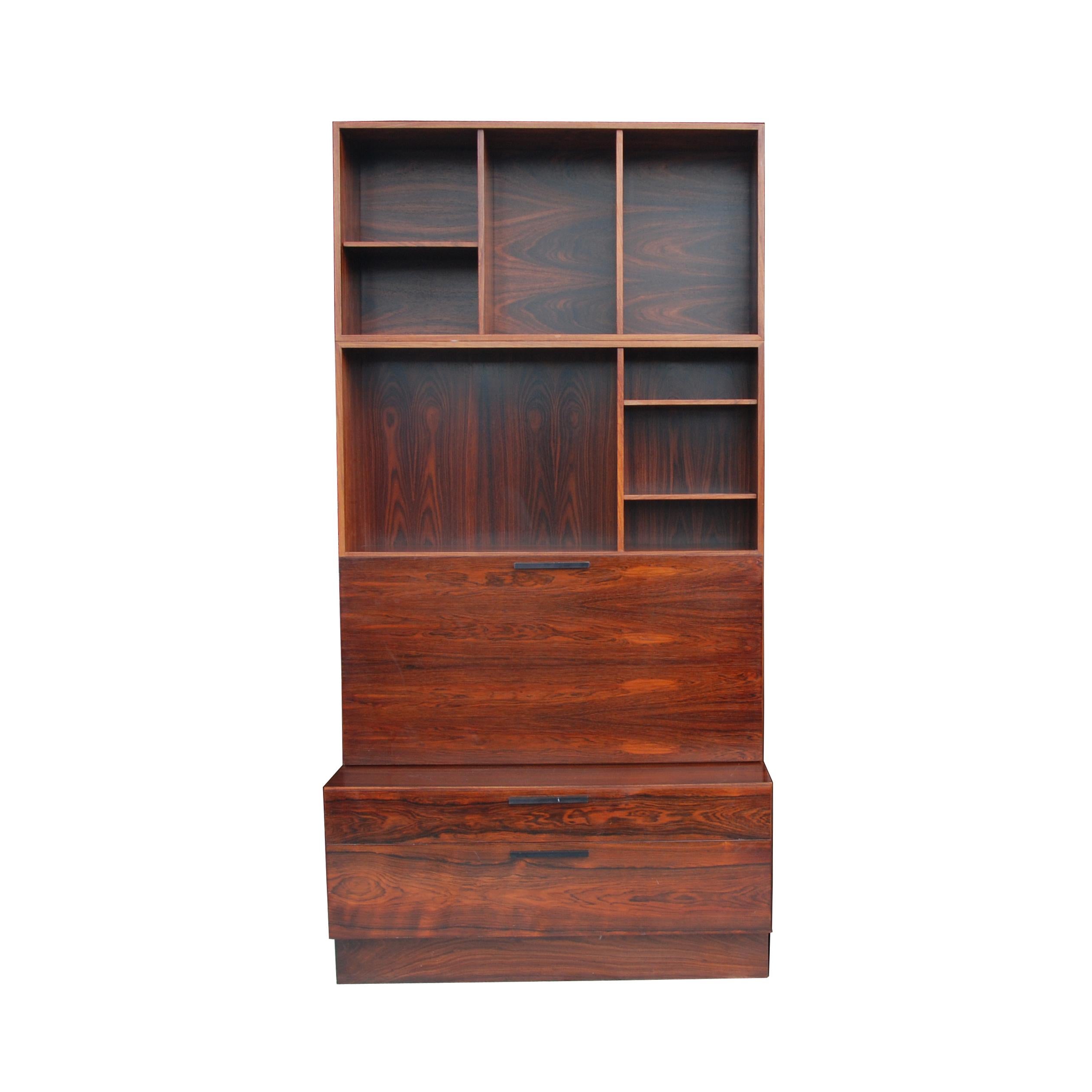 Rosewood bookcase by Ib Kofod-Larsen for Faarup Møbelfabrik,
1960s

Richly grained rosewood in different configurations of open and closed storage with ample drawer space.

2 cabinets can be configured as one wide piece (90.5